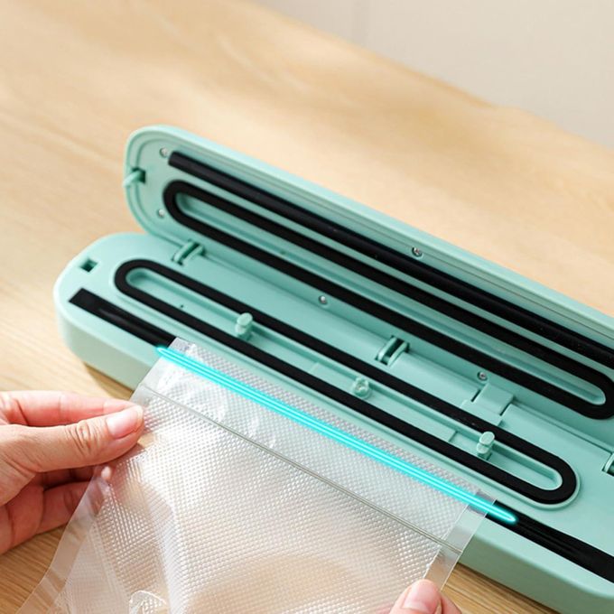 Machine de mise sous vide, machine de mise sous vide alimentaire